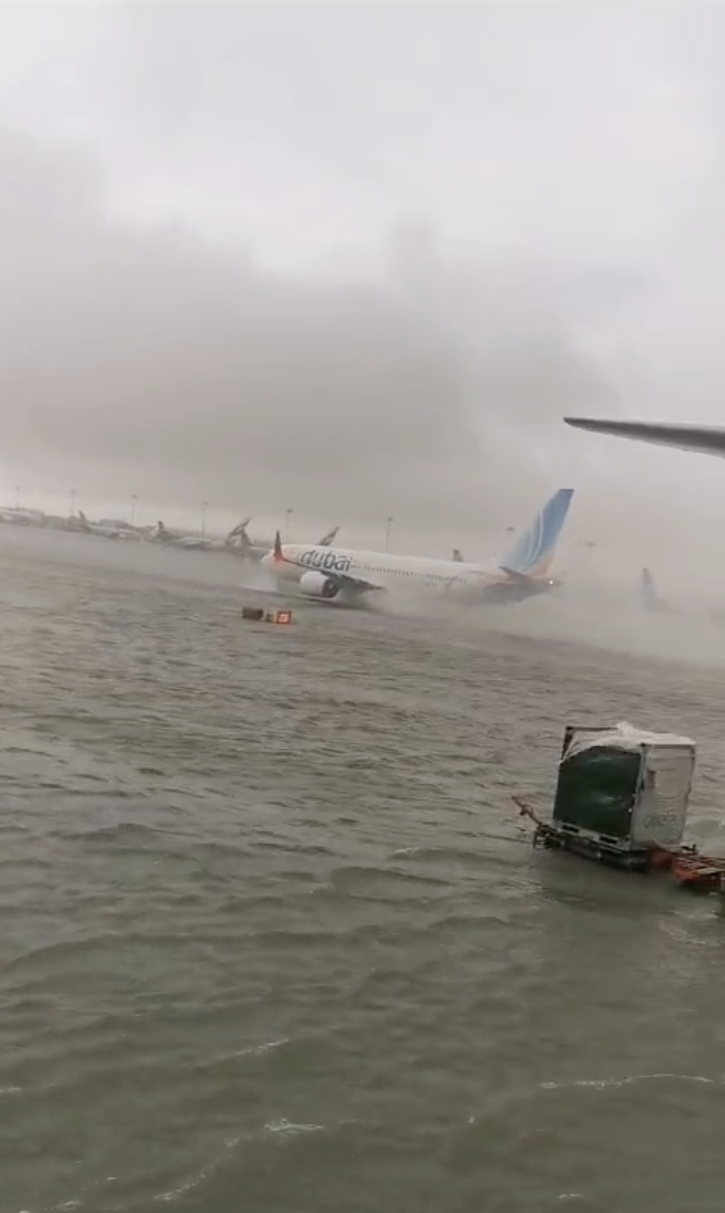 A plane surrounded by water at DBX.